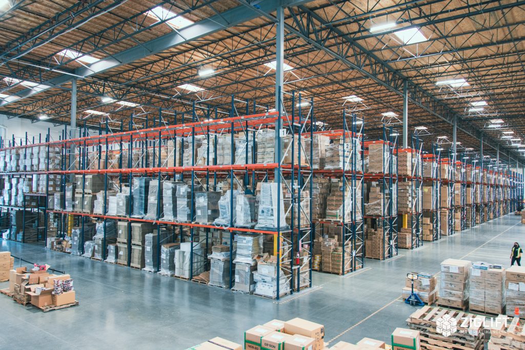 Rows of industrial pallet racks loaded with pallets in a South Florida warehouse